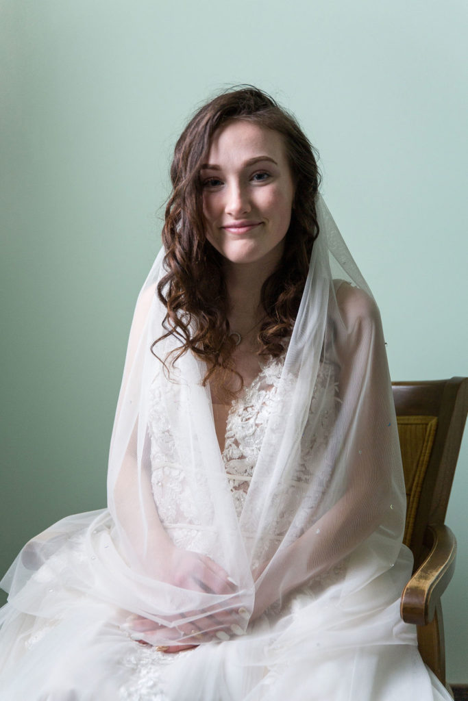 bridal portrait in wedding dress at Trinity Missionary Church in Yale, Michigan
