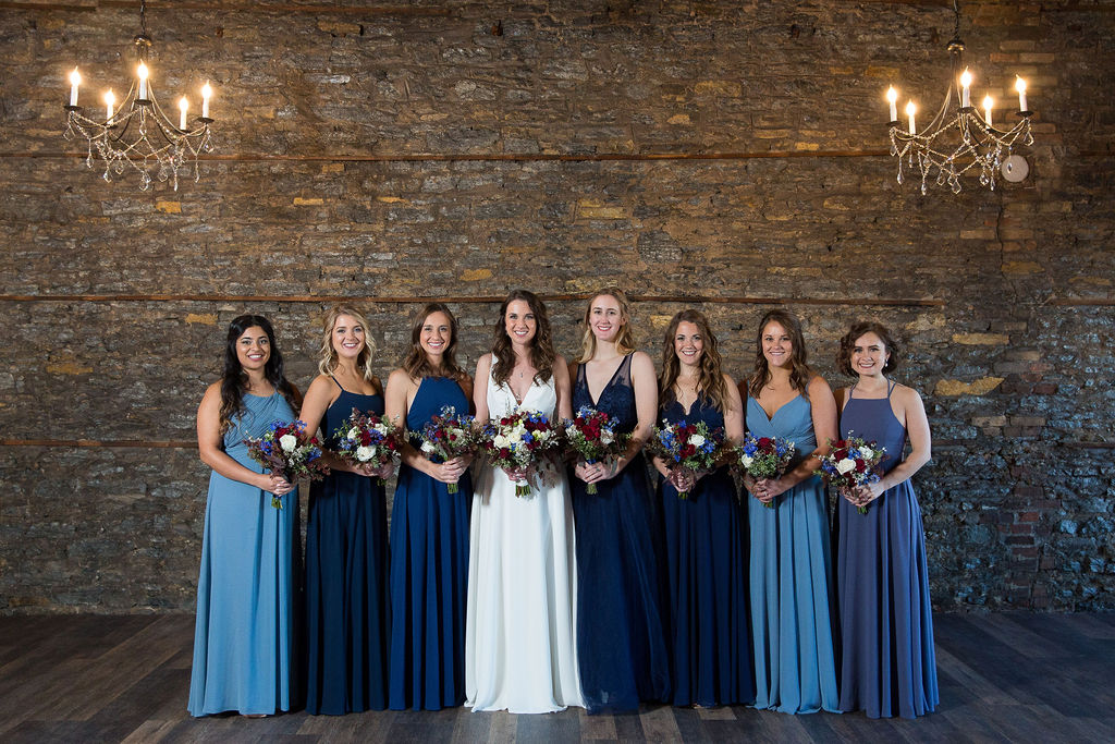 bridal party poses inside the earl and winston in St. Paul, MN