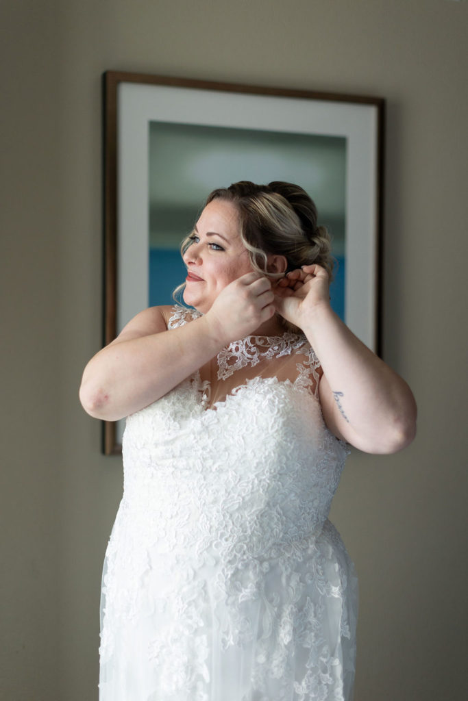 Bride in a Pierra's bridal wedding gown during her Lansing Wedding photographed by Taylor Ingles Photography