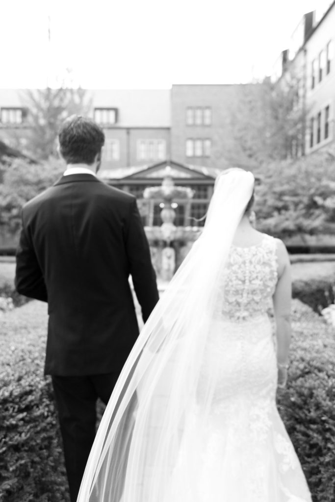 Bride and Groom portraits in the Royal Park Hotel Gardens in Rochester, Michigan