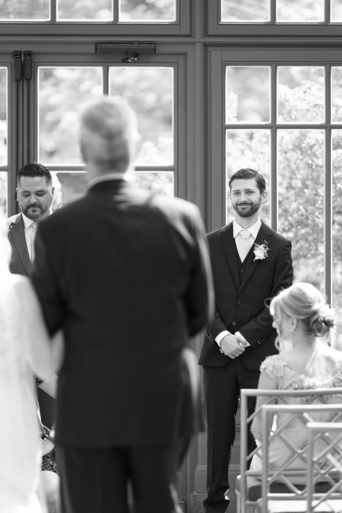 Wedding ceremony at the Royal Park Hotel Conservatory in Rochester, Michigan