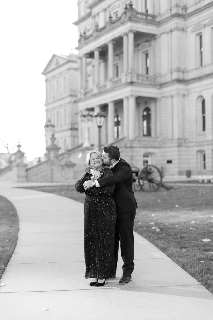 couple hugging near the Lansing Capitol Building