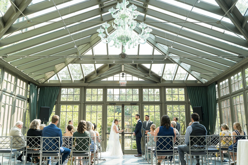 Wedding ceremony at the Royal Park Hotel Conservatory in Rochester, Michigan