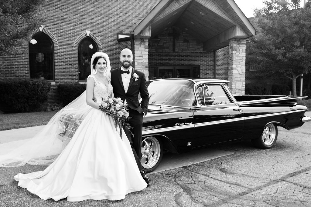 Vintage Car Rental at CityFlatsHotel and Trinity Lutheran Church in Port Huron wedding photographed by Taylor Ingles Photography
